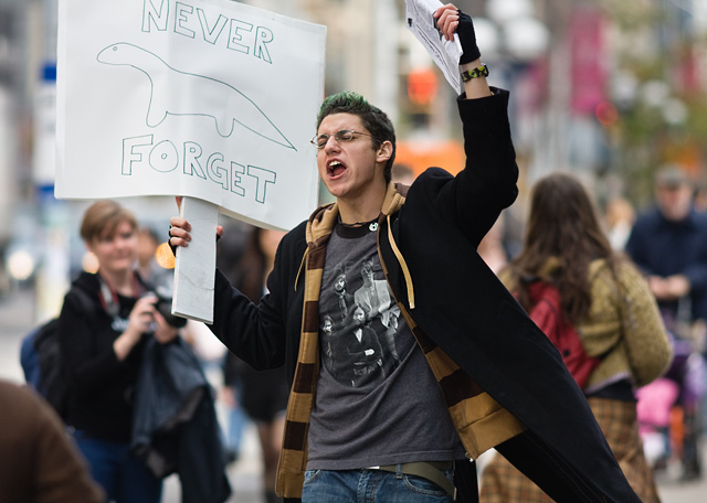 dino_protest_22 Agent Unknown gets the crowd chanting